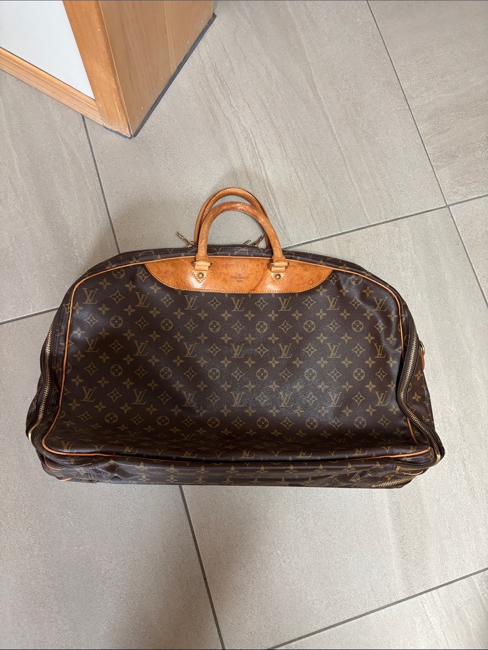 Authentic Louis Vuitton Monogram Canvas Travel Bag with Vachetta Trim